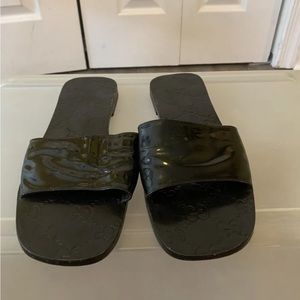 Gucci black leather slides